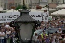 Poland Greets Romney With Huge Ron Paul Banner